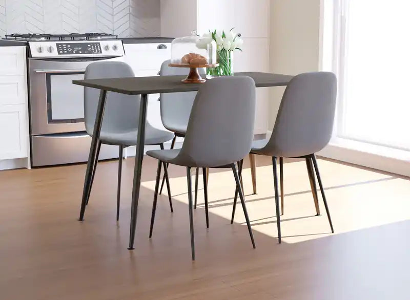 Chaise de salle à manger avec assise en tissu gris et piètement robuste en métal noir