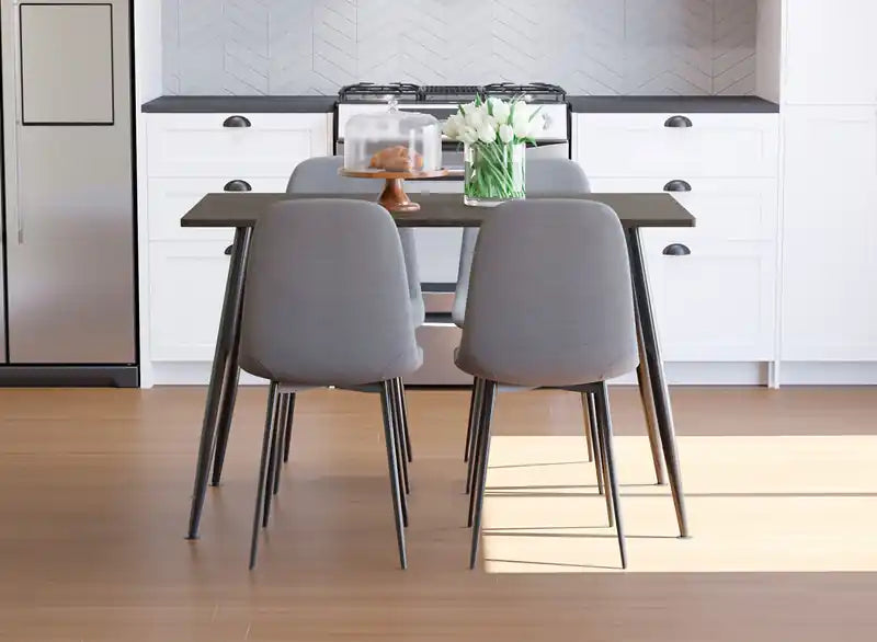 Chaise de salle à manger avec assise en tissu gris et piètement robuste en métal noir
